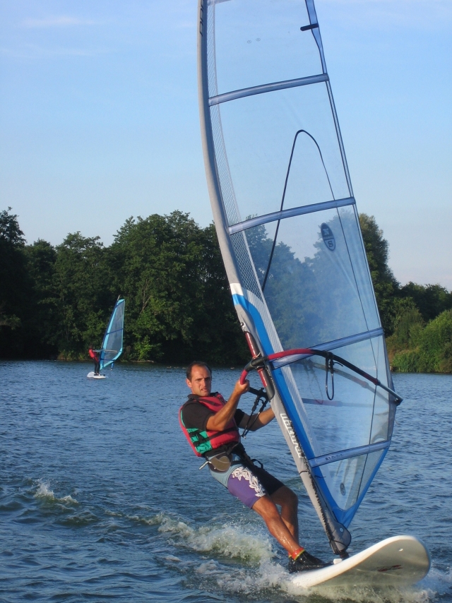 Feel the wind at your back windsurfing